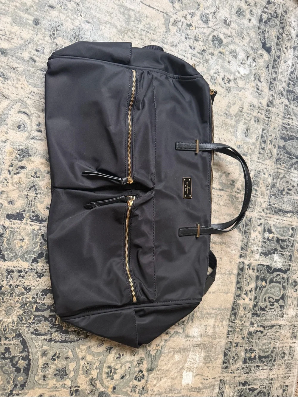 kate spade black nylon duffel with gold hardware